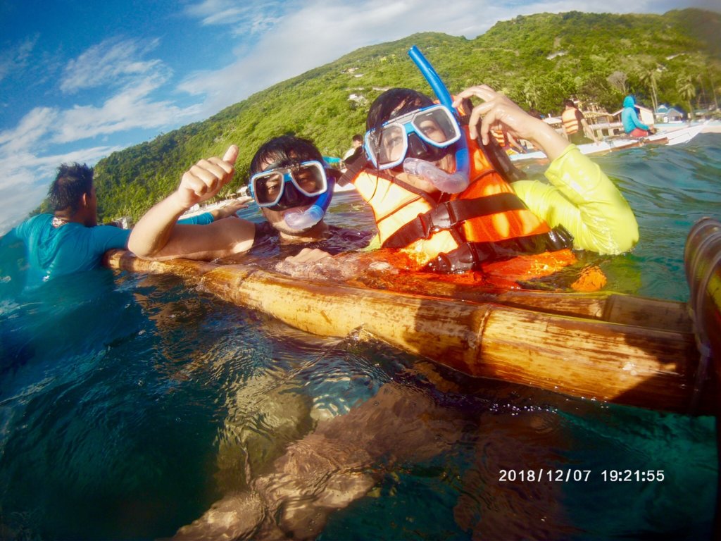 Swimming with whale sharks