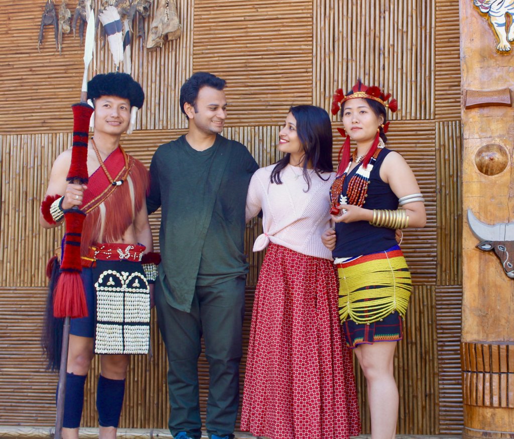 MJ and Shu with a couple wearing Tribal Dress in Hornbill Festival in Nagaland.